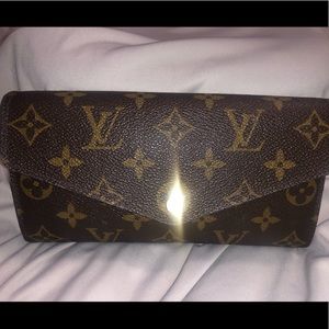 Louis Vuitton Sarah wallet with box, dust bag.